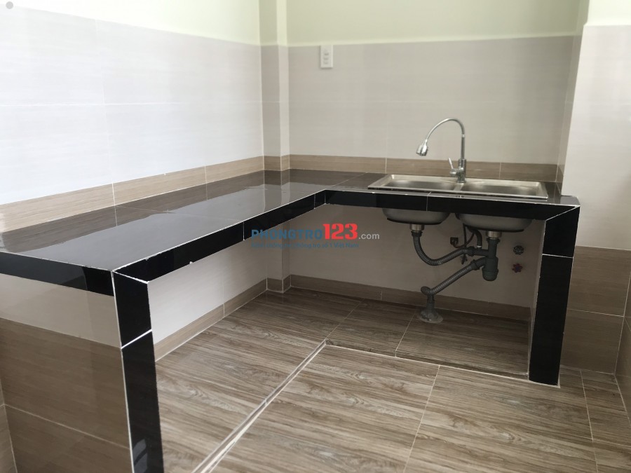 Căn hộ mini mới xây, có thang may, 30m2, WC riêng, hệ thống camera, báo cháy, có máy lạnh, ban công, sân phơi đồ