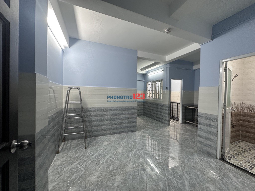 Nhà trọ 30m2 đường Phạm Văn Hai Q. Tân Bình, gần chợ PV2