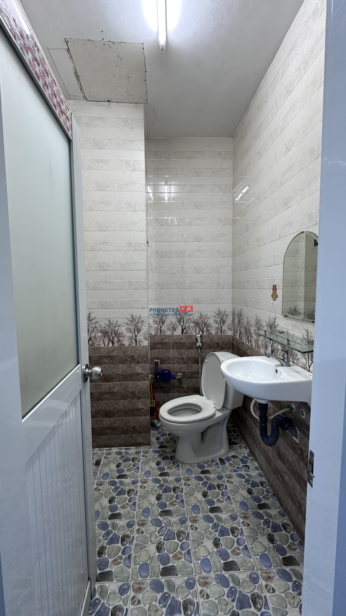 Nhà trọ 30m2 đường Phạm Văn Hai Q. Tân Bình, gần chợ PV2