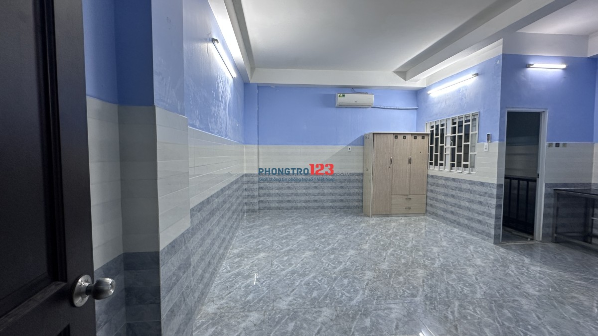 Nhà trọ 30m2 đường Phạm Văn Hai Q. Tân Bình, gần chợ PV2