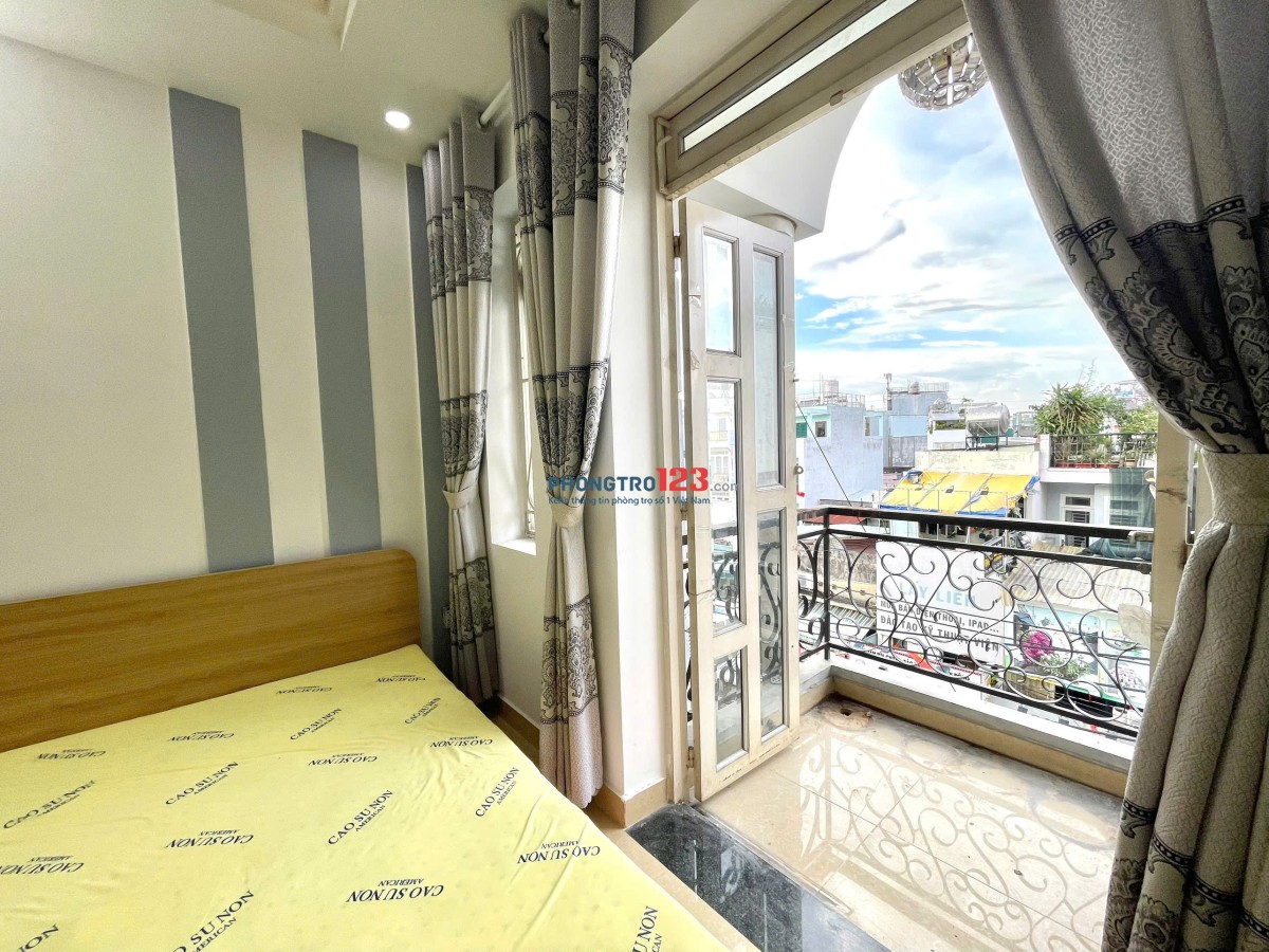 Cho thuê phòng siêu rộng ~50m², ban công lớn, máy giặt riêng – Phan Văn Trị, Bình Thạnh gần VLU, IUH