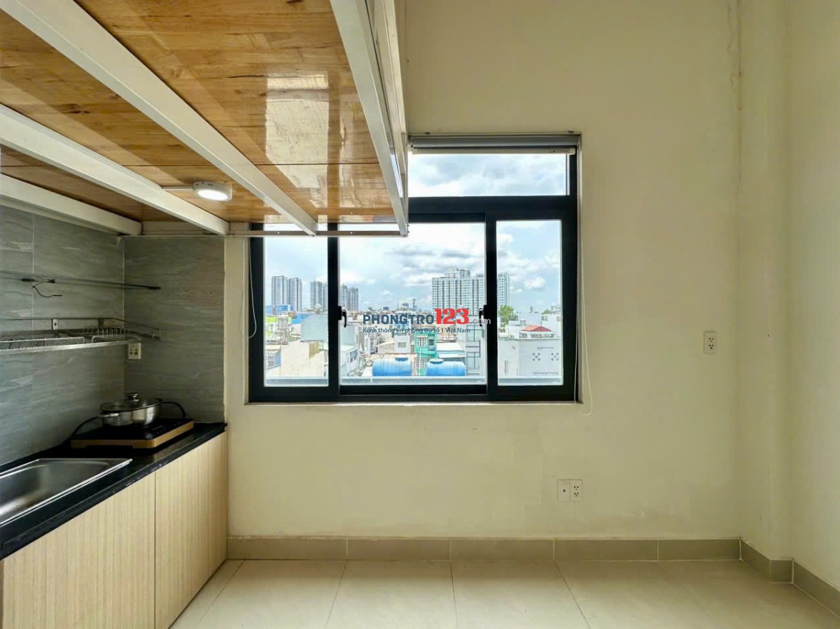 Gác lửng cửa sổ thoáng tòa nhà sạch đẹp - Phan Văn Hân gần chợ Thị Nghè
